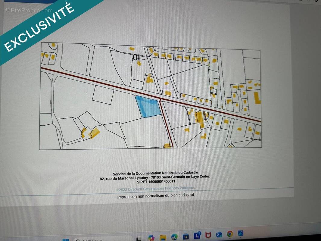 Photo 1 - Terrain à PLOUIGNEAU