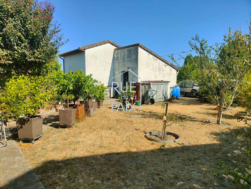 Maison  5 pièce(s) 119 m2 + Garage et atelier sur 752m² de terrain. - photo 11