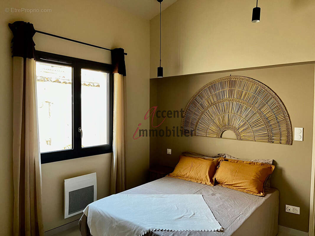 EXCLUSIVITE : Maison plain pied avec jardin T2 Bis (mezzanine) et places de parking - photo 5