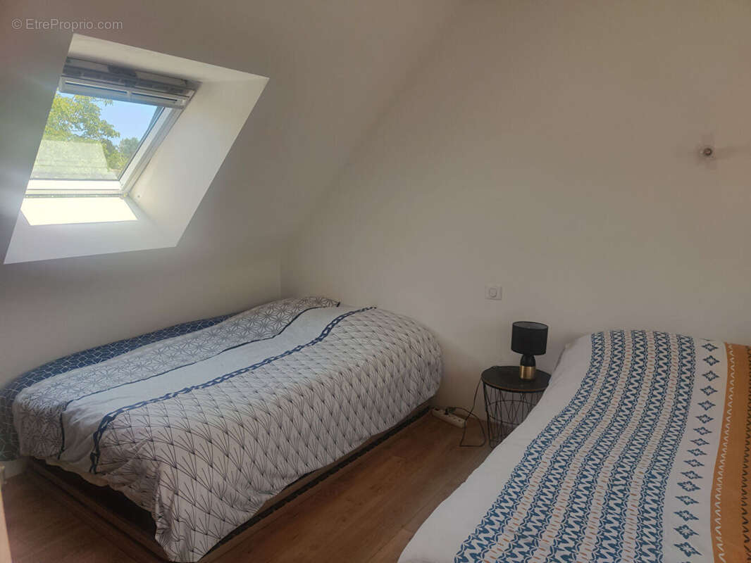 A découvrir à Plougonver - le confort du récent : 3 chambres, vie de plain-pied et un cadre de vie paisible - photo 10