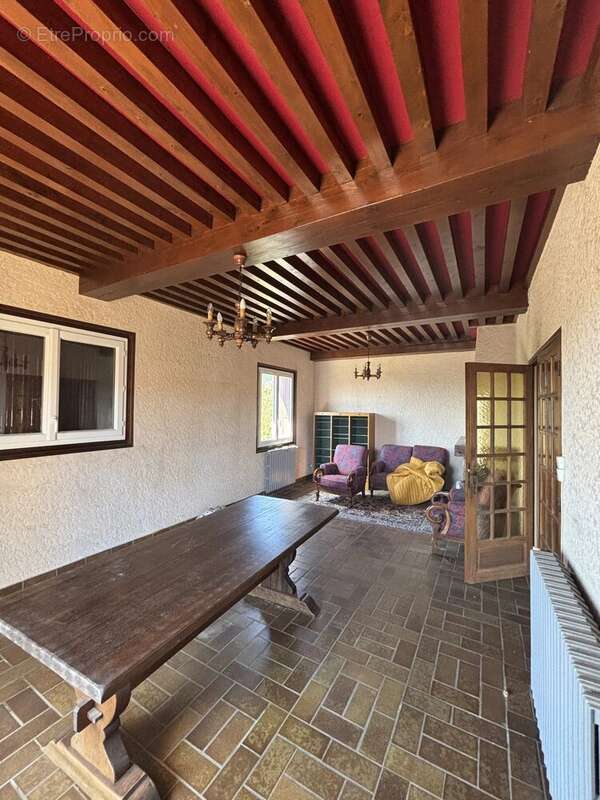Maison de plain pied avec sous sol semi enterré - photo 2