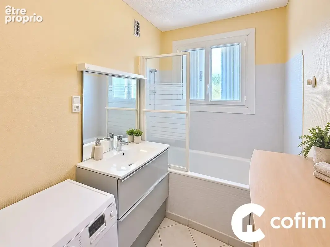 Appartement 3 pièces 73 m² à vendre à Mourenx (64150) - photo 4