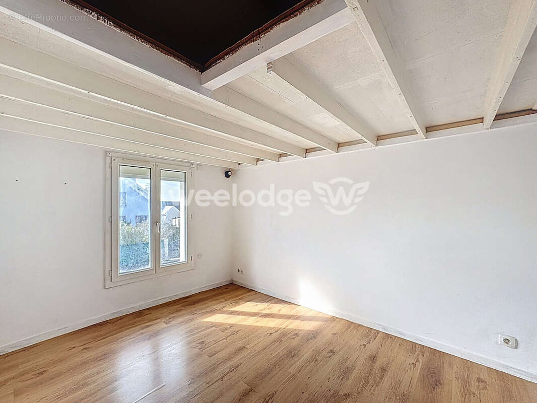 Maison à CHANTELOUP-LES-VIGNES