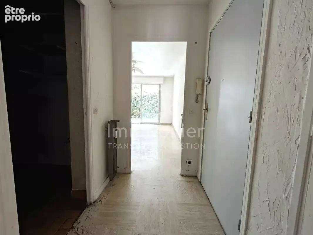 T3 traversant sud-nord 62m² rez-de-jardin - photo 12