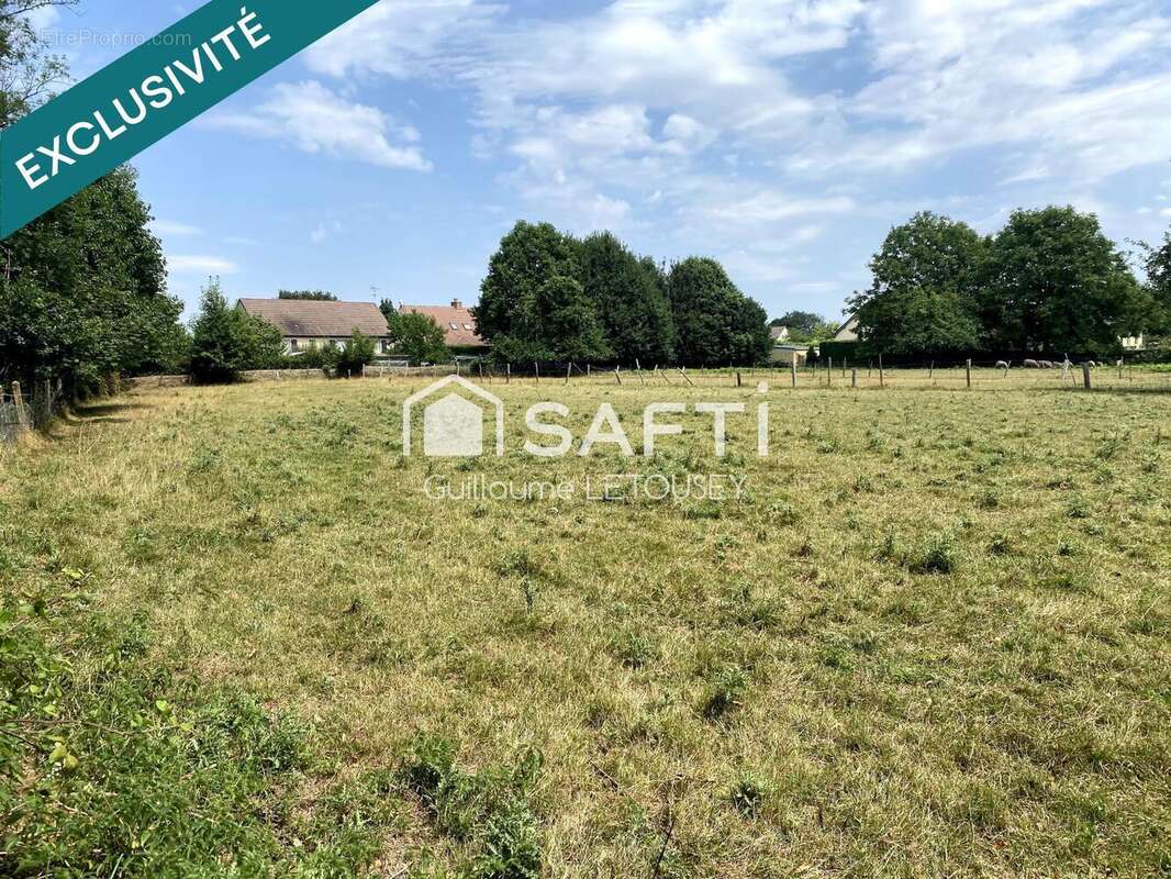 Terrain 6141 m² à La Lucerne-D'outremer  - photo 2