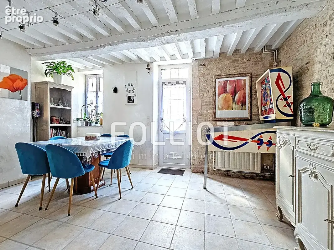 Maison en PIERRE de140 m²  de 7 pièces et 4 chambres avec un garage  àThaon - photo 3