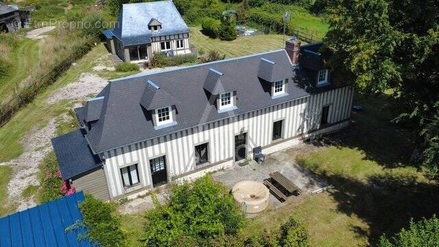 Maison à SAINT-SYLVESTRE-DE-CORMEILLES