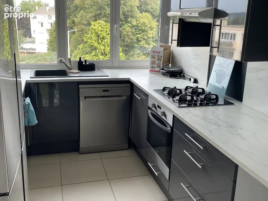 Appartement avec 2 caves et parking – Le Grand-Quevilly - photo 4
