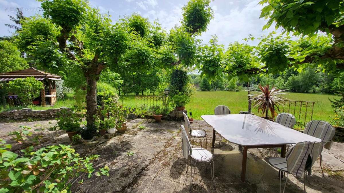 24410 Maison  atypique  sur 2 niveaux entre Riberac  et Saint Aulaye parcelle de  4ha et un étang - photo 7