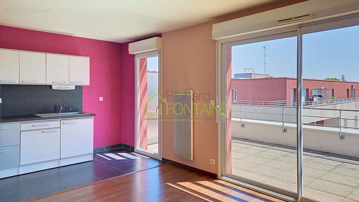 Appartement T2 en dernier étage avec grande terrasse et garage femé en sous-sol - photo 3