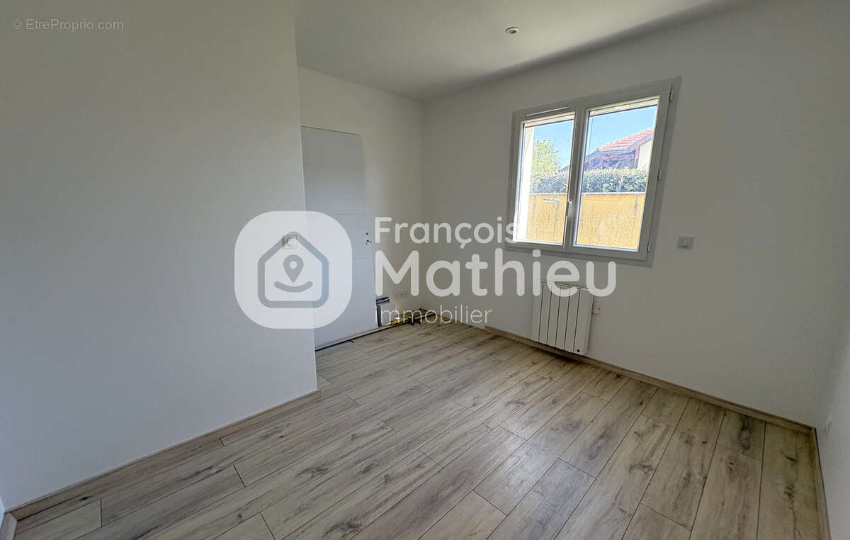 Saint-André-le-Bouchoux - Maison neuve de plain-pied sur 503 m2 de terrain - photo 10