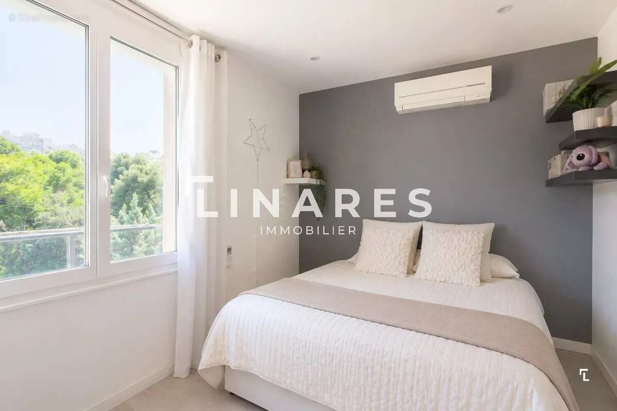 AU DESSUS DES TOITS - Appartement T4 de 77m2 - Extérieur + Dernier étage + Vue mer - 13007 BOMPARD - photo 7