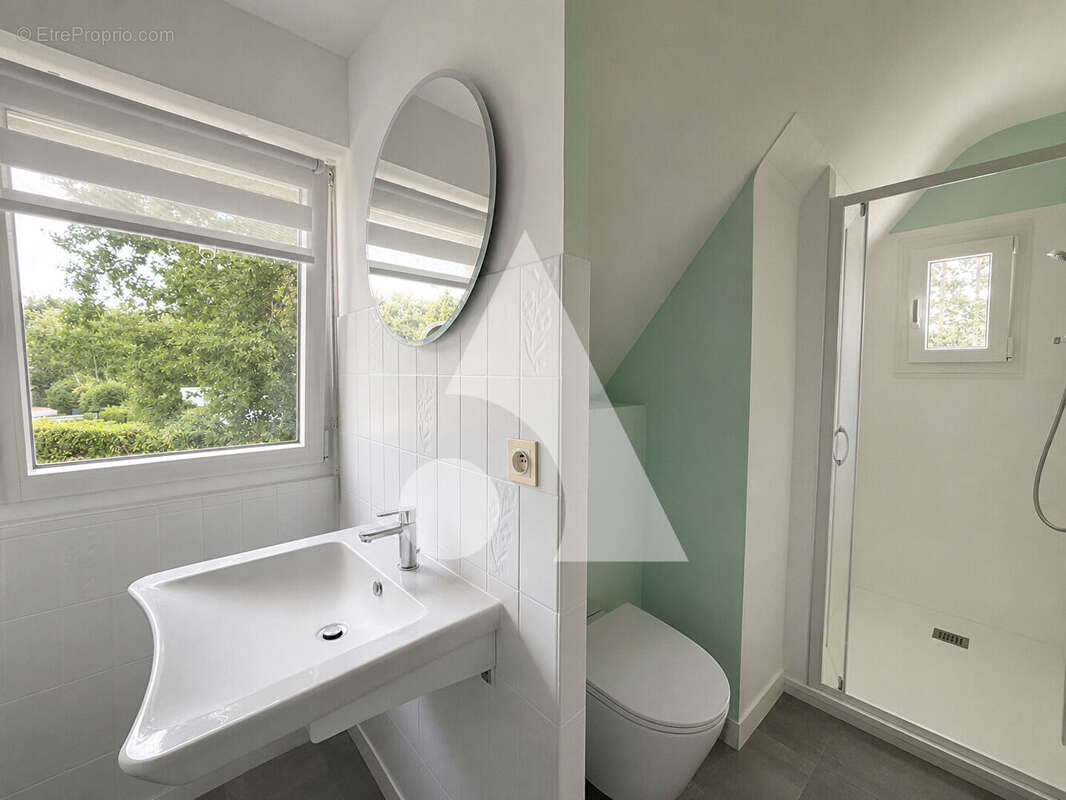 Maison Ploemel 9 pièce(s) 230 m2 - photo 9
