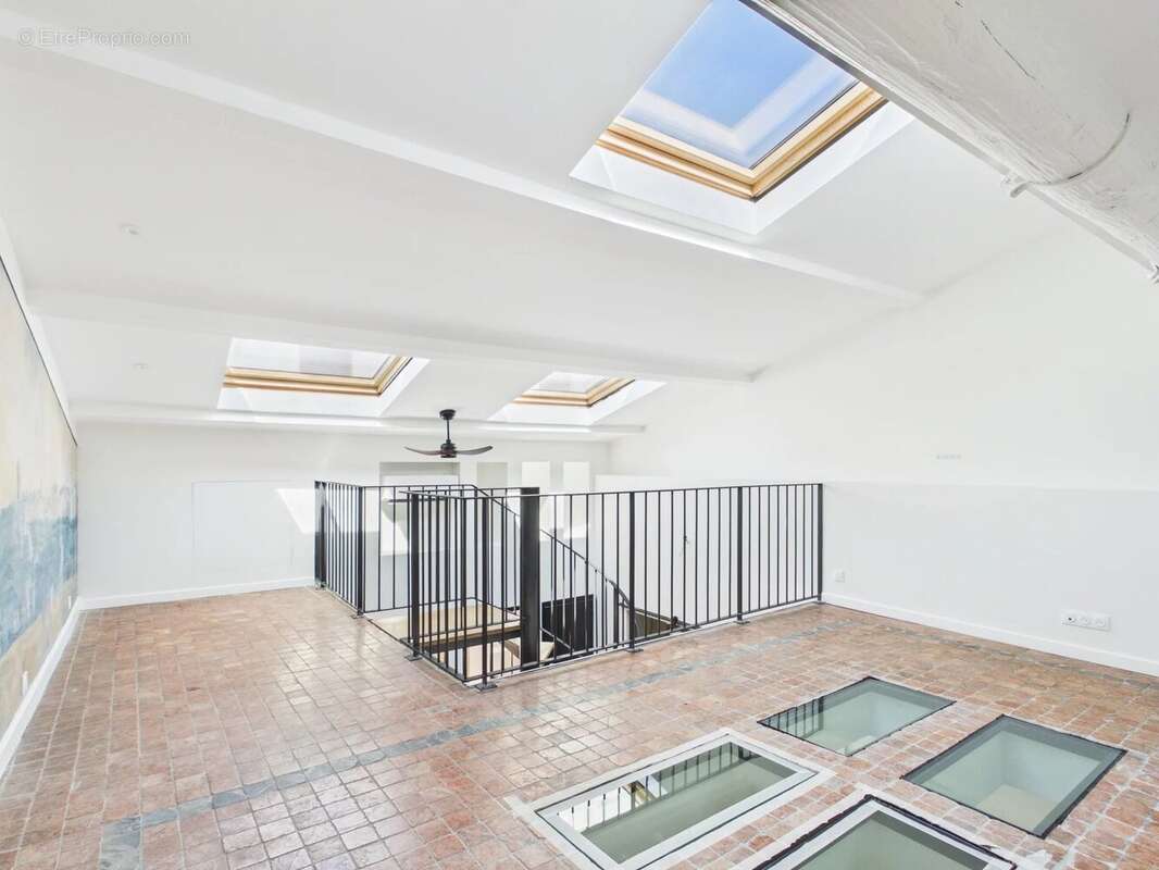 Duplex au charme historique de 102 m² - photo 10