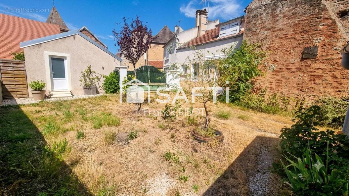 Photo 1 - Maison à SAVIGNY-EN-TERRE-PLAINE