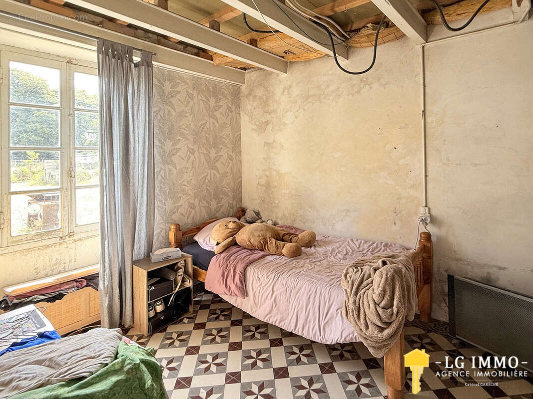 Bâtisse charentaise de 1750 à fort potentiel - photo 5