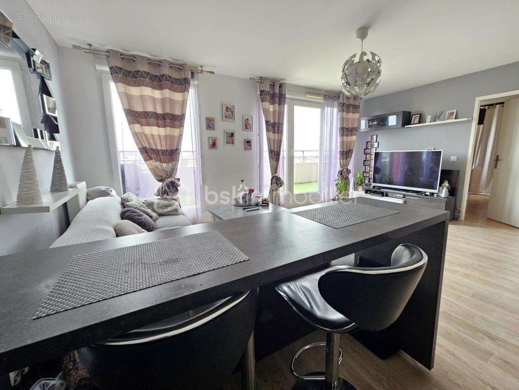 Appartement dernier étage F2 44m² terrasse 14m² SUD parking DPE C - photo 7
