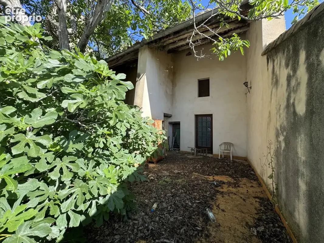 Maison à LAUDUN-L'ARDOISE