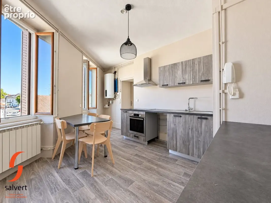 A vendre, Immeuble comprenant 5 appartements et 1 commerce. - photo 5