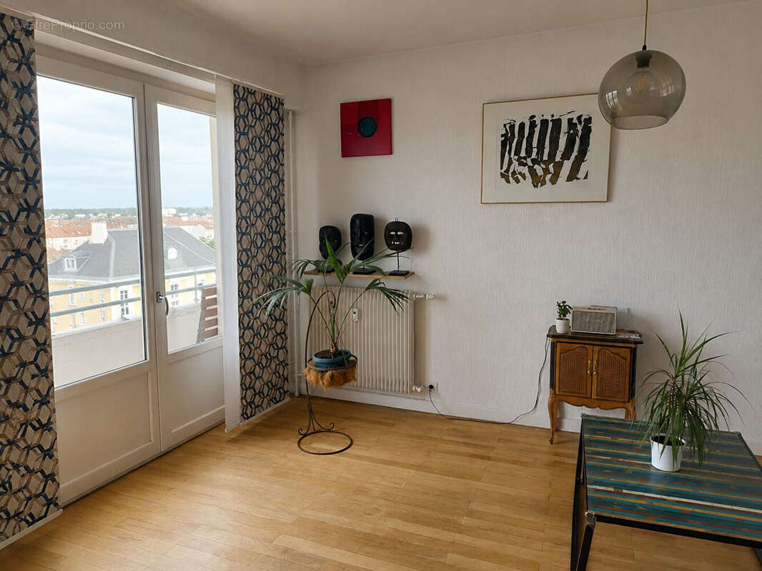 A VENDRE ROANNE CENTRE VILLE, Appartement de type 4 de 91.28 m2 - photo 4