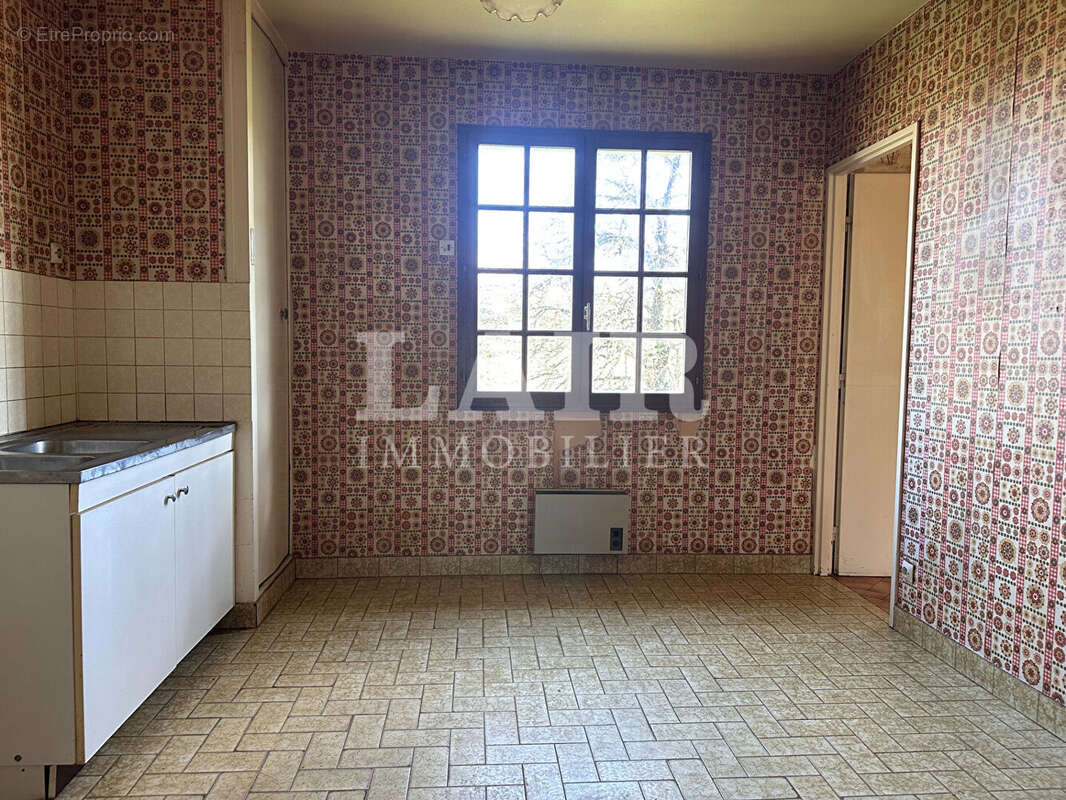 Maison à CONDE-SUR-HUISNE