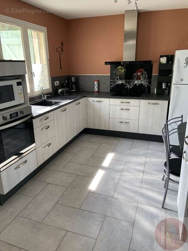Belle villa de plaind- pied et son terrain de 1203m² - photo 6
