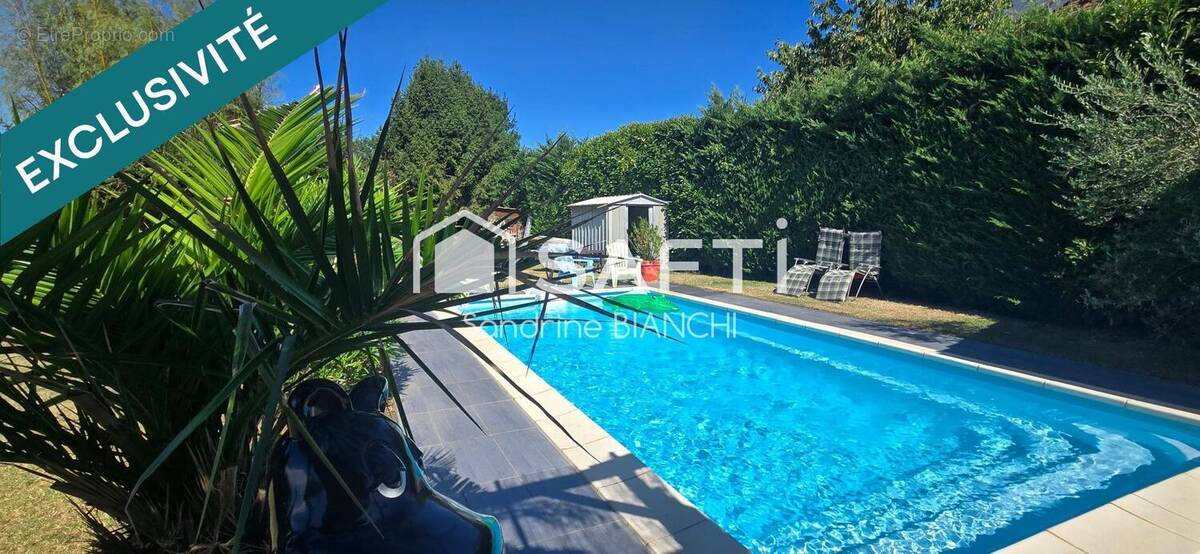 Photo 1 - Maison à CHARVIEU-CHAVAGNEUX