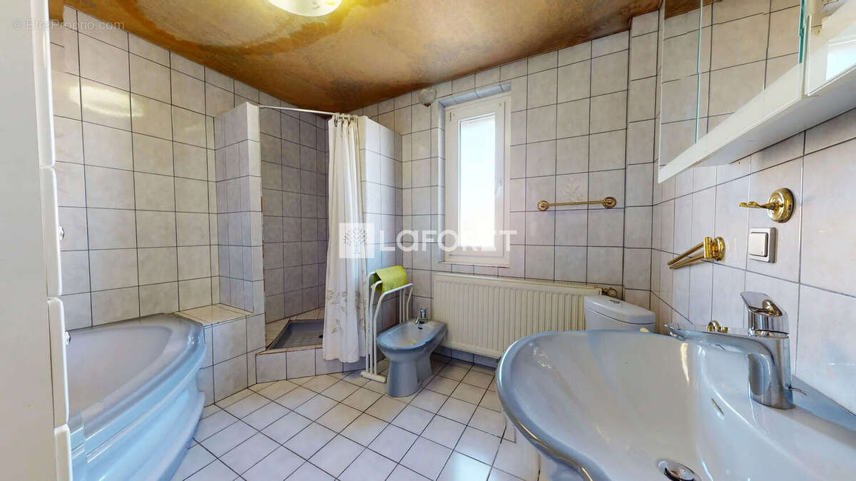 Maison pleine de charme à Schiltigheim, (env. 120 m² au sol) sur 3,71 ares - photo 14