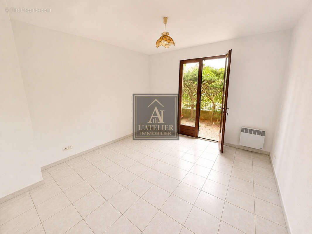 Appartement en rez-de-jardin avec extérieurs à proximité des commodités - photo 9