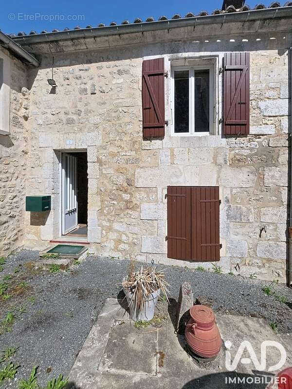 Photo 2 - Maison à LA ROCHEBEAUCOURT-ET-ARGENTINE