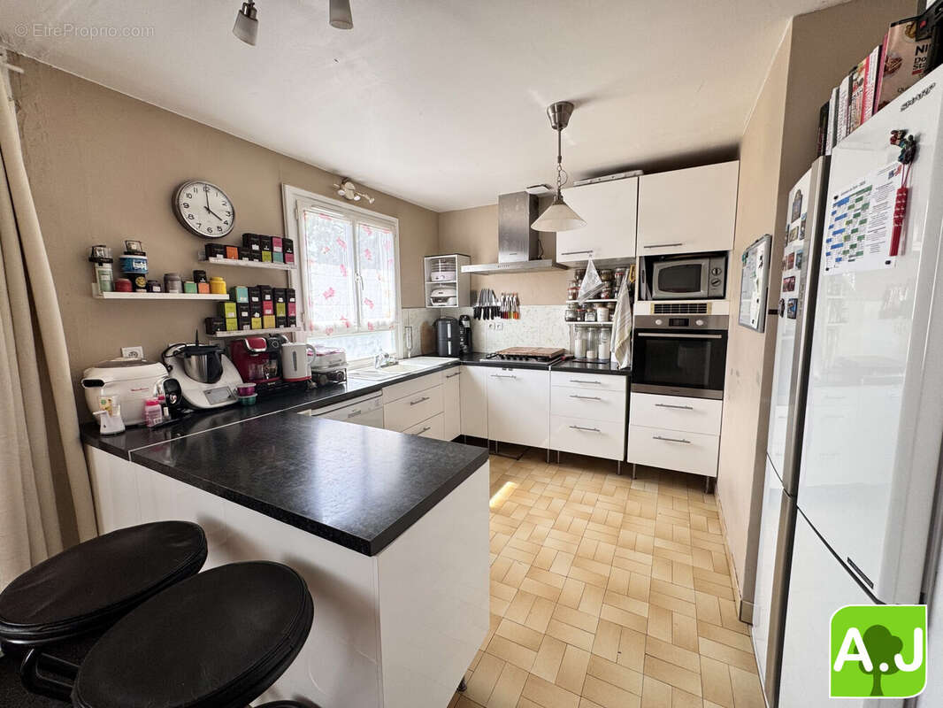 Maison 110 m² à Garennes-Sur-Eure  - photo 4
