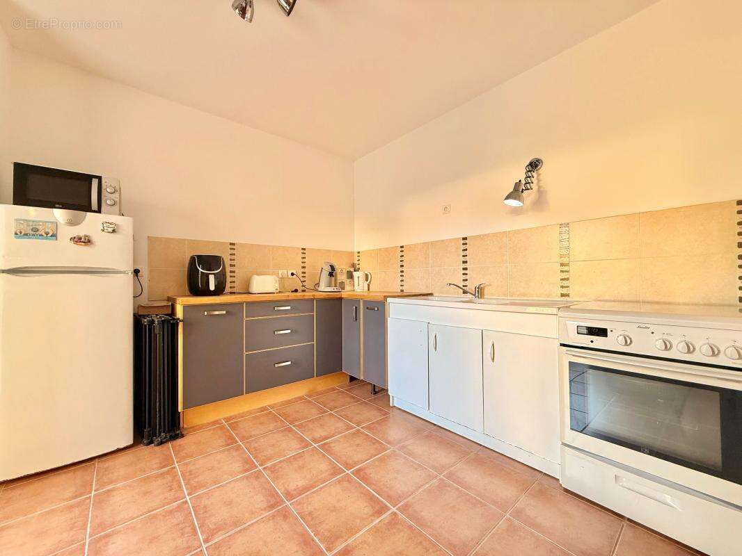Appartement T3 avec jardin privatif et place de stationnement - photo 4