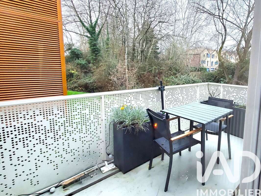 Photo 4 - Appartement à VOISINS-LE-BRETONNEUX