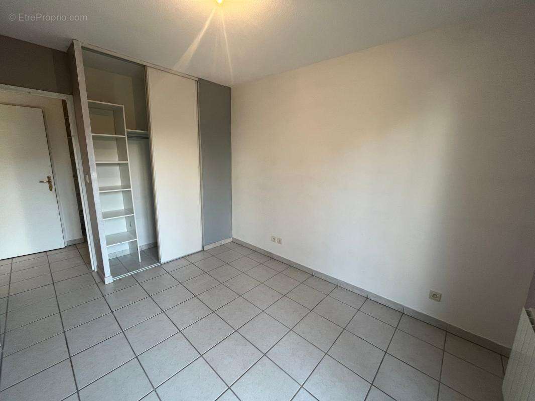 Appartement T4 de 86 m² en rez-de-jardin – Centre de Pont-de-Chéruy - photo 10
