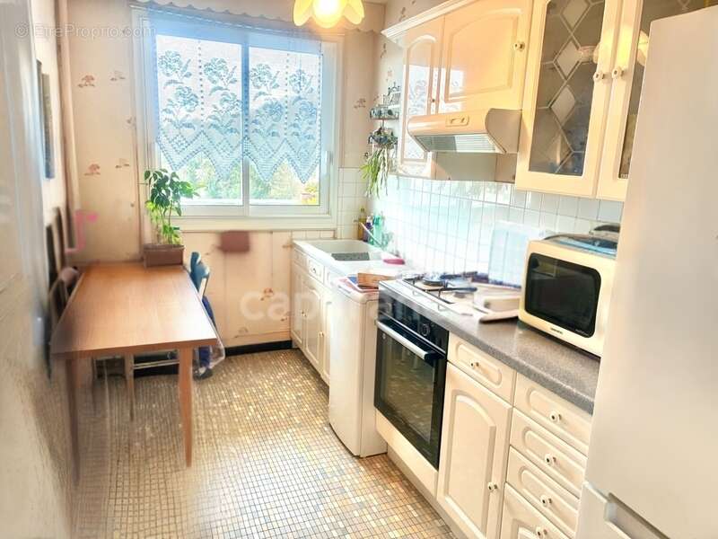 *Dans le quartier des ormeaux* Appartement de 46 m² exposé Ouest, vue dégagée sur la ville et la mer, parking et cave - photo 3