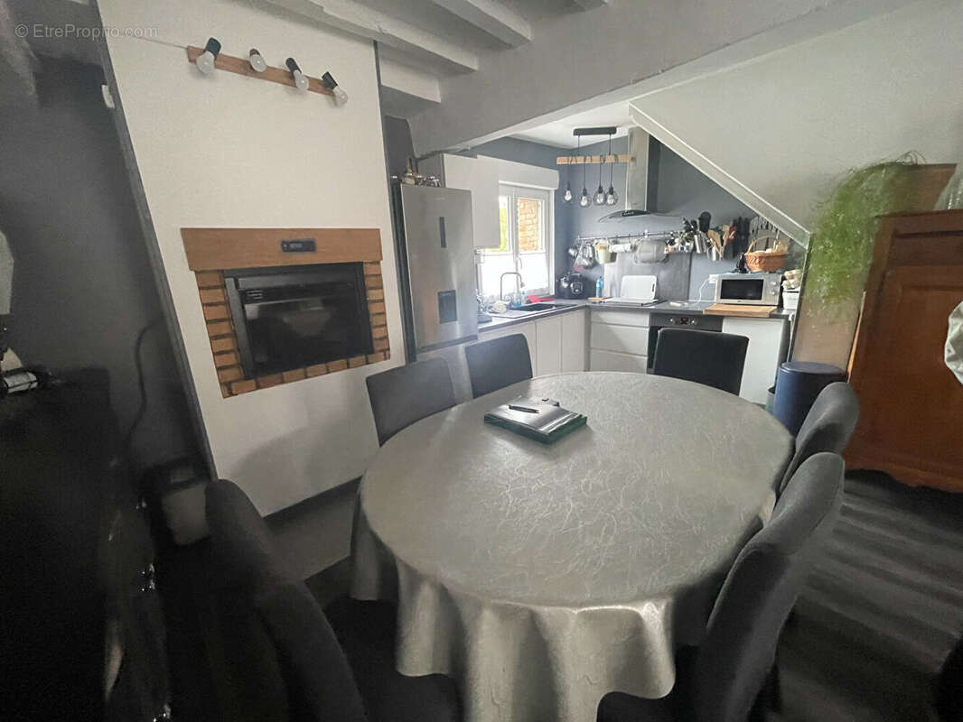 Immeuble 7 appartements-CENTRE VILLE GUISE - photo 5