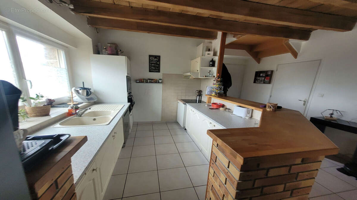 Maison à SAINT-AUBIN-D'AUBIGNE