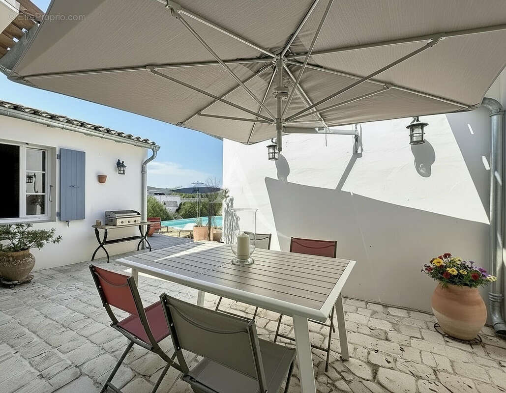 Villa de style rhétais 7 pièces - piscine chauffée - photo 9