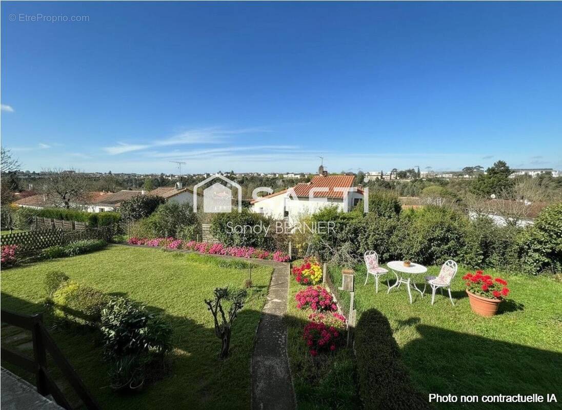 Photo 1 - Maison à BUXEROLLES