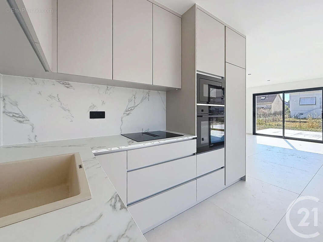 Maison 139 m² à Chevigny-Saint-Sauveur  - photo 4