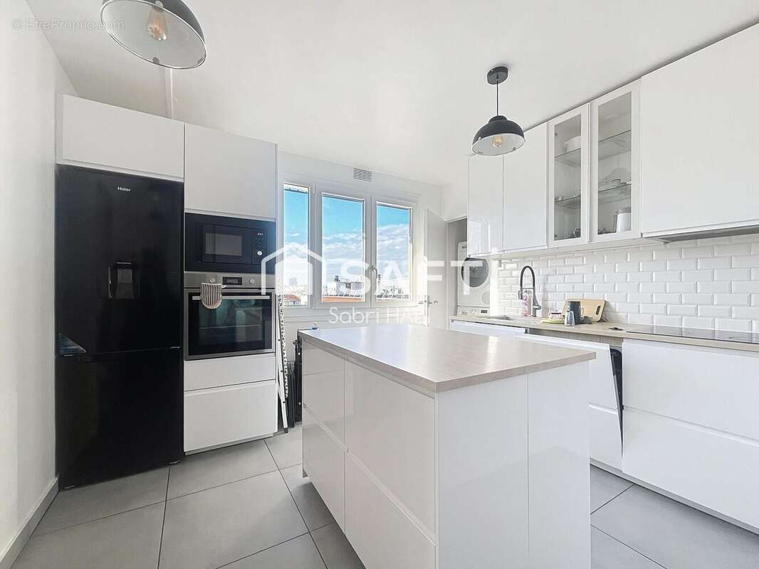 Photo 4 - Appartement à COURBEVOIE