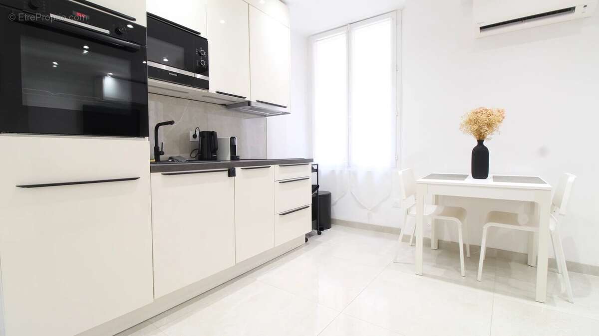 Studio optimisé en 2 pièces de 27 m² entièrement rénové - photo 3