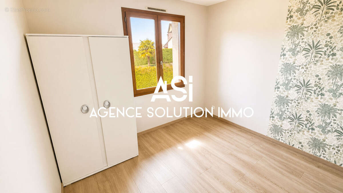 Maison de plain-pied avec sous-sol complet - Actuellement louée - photo 5