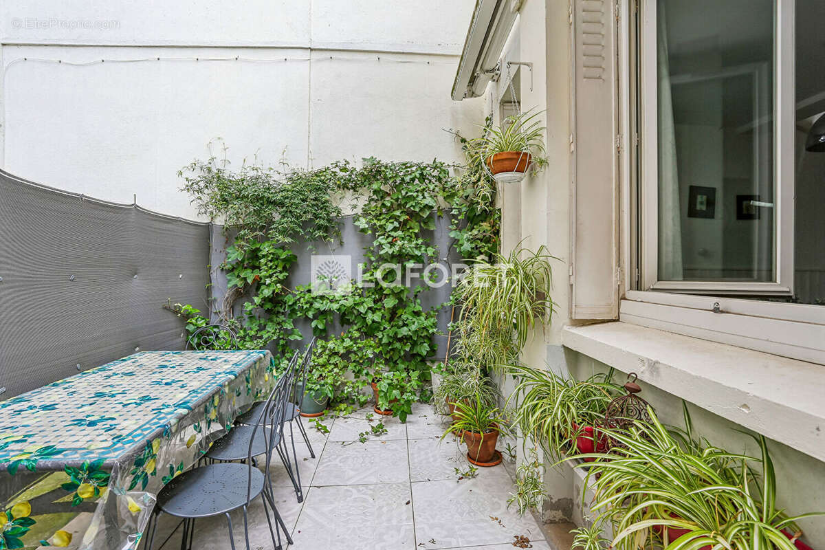 Appartement Paris 2 pièce(s) 42 m2 - photo 2