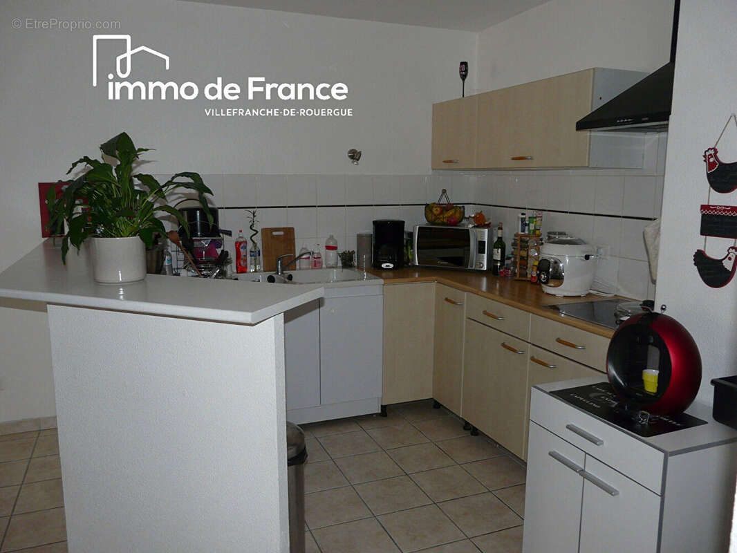 Appartement loué Villefranche De Rouergue 2 pièces, 78 m² avec jardin, garage et parking - photo 6
