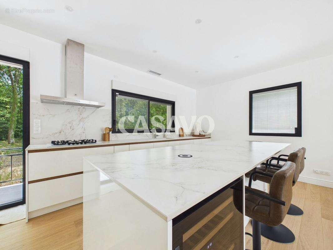 Vente Maison 5 pièces de 152m² - 33850 Léognan - photo 9