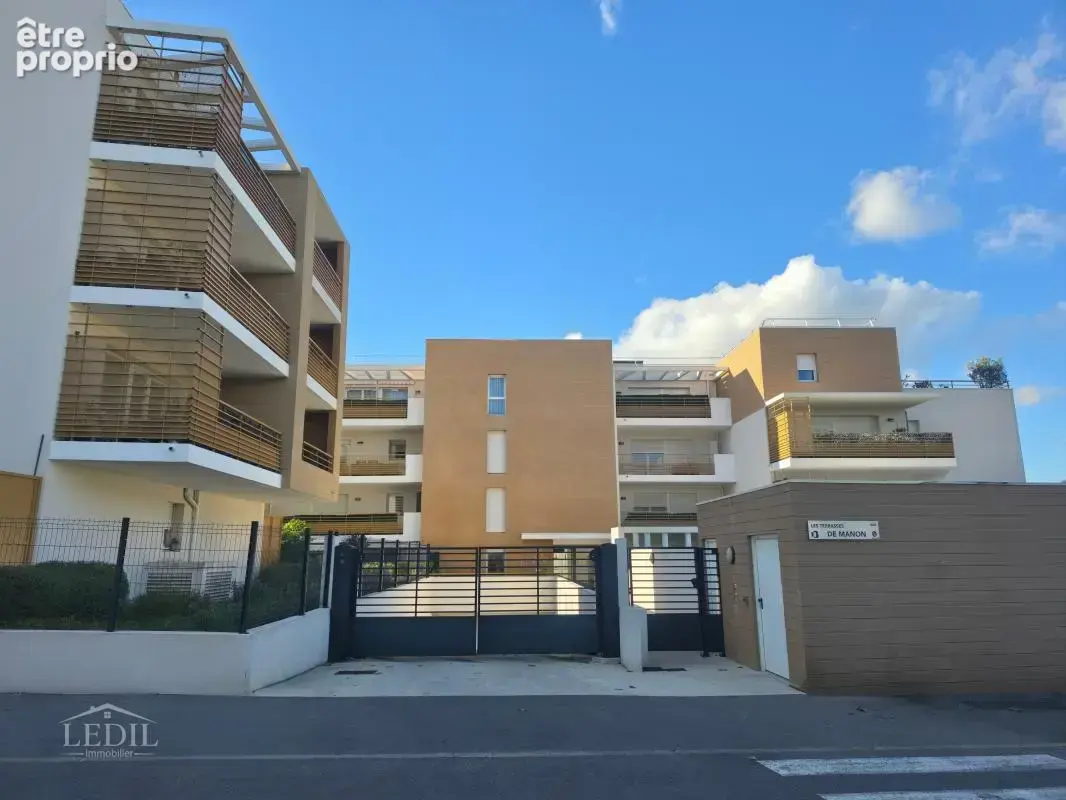 T2 de 41,6 m² avec terrasse de 11m² et garage dans une résidence récente - photo 7