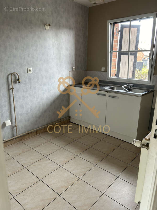 Maison à COURRIERES