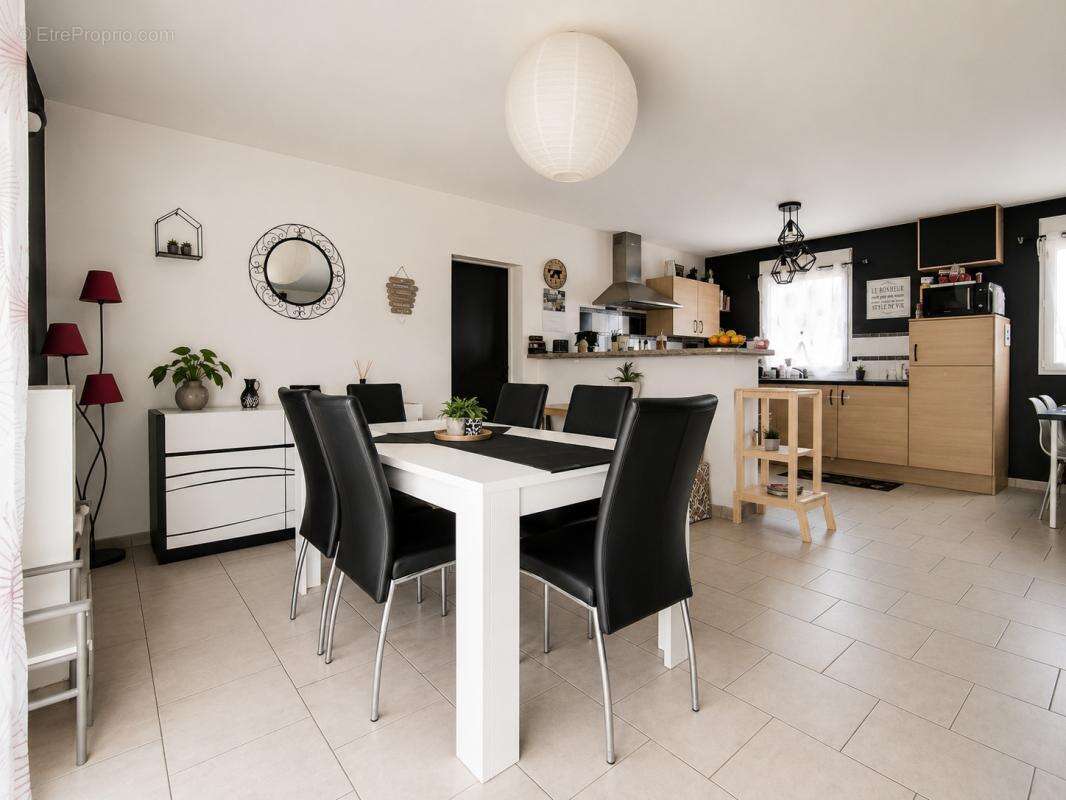 Maison 5 pièces 105m2 - photo 2