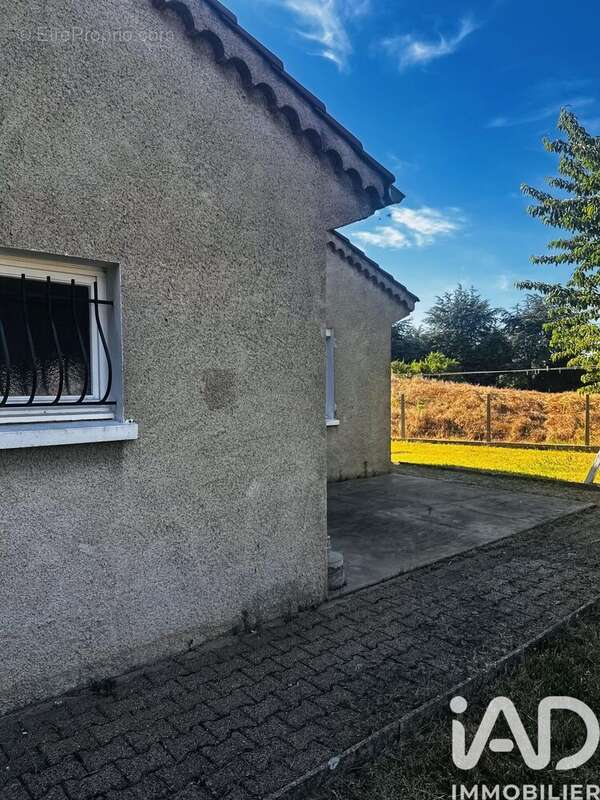 Photo 2 - Maison à ANDREZIEUX-BOUTHEON